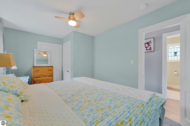 1029 E Front St, Traverse City, MI 49686 - bedroom featuring wood finished floors and ceiling fan