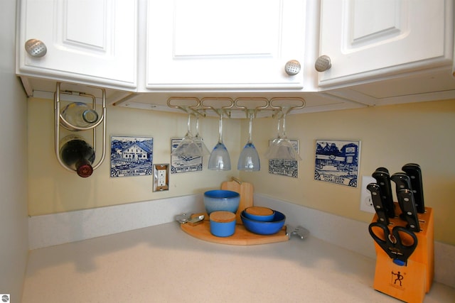 13354 Stover Rd Unit 6, Charlevoix, MI 49720 - kitchen view of white cabinets and light countertops