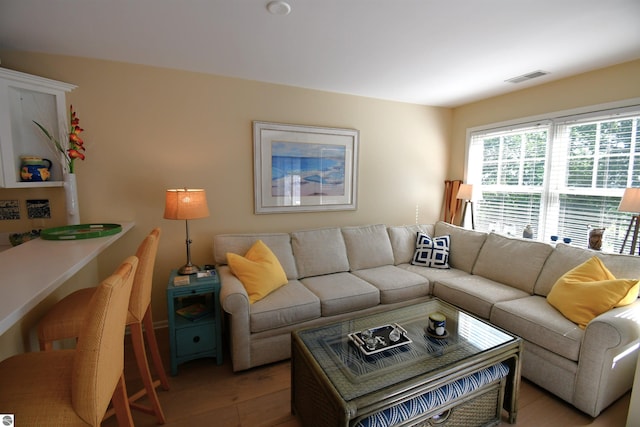 13354 Stover Rd Unit 6, Charlevoix, MI 49720 - living area featuring light wood-style flooring