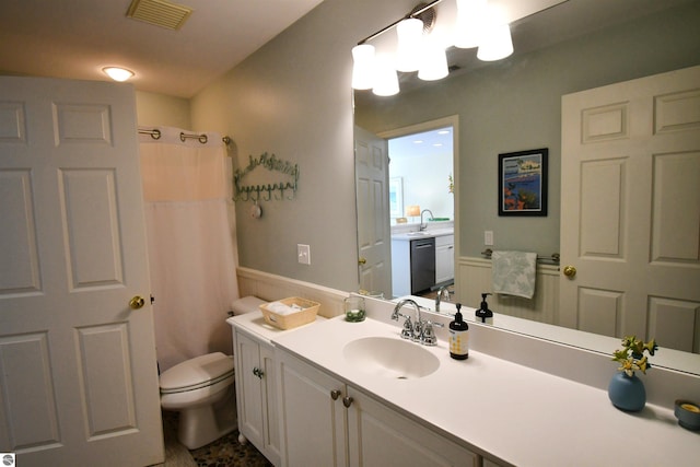 13354 Stover Rd Unit 6, Charlevoix, MI 49720 - full bath with vanity, wainscoting, and a shower with shower curtain