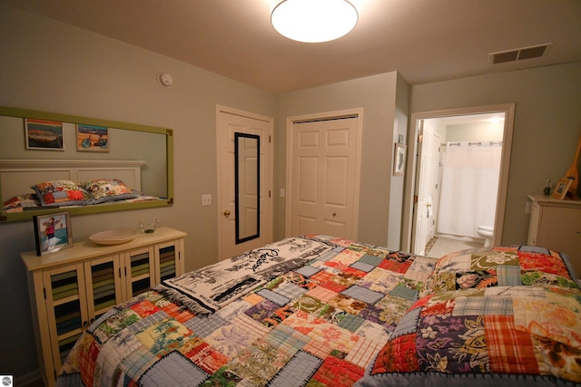 13354 Stover Rd Unit 6, Charlevoix, MI 49720 - bedroom featuring a closet and connected bathroom