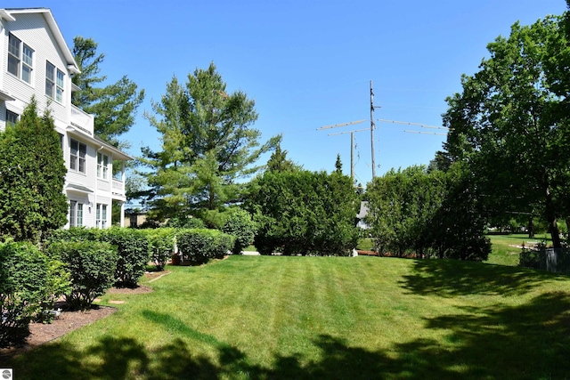 13354 Stover Rd Unit 6, Charlevoix, MI 49720 - view of green lawn