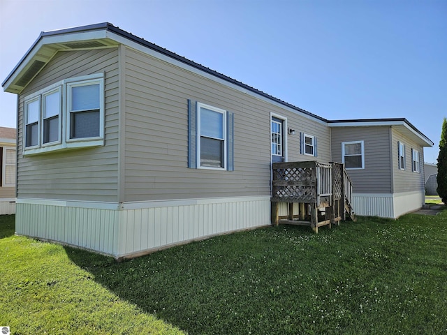 4151 E Jordan Rd Lot 51, Mount Pleasant, MI 48858 - view of side of property with a yard