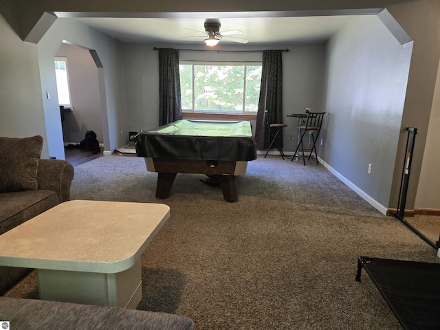 3962 Power Dr, Mikado, MI 48745 - recreation room featuring arched walkways, a ceiling fan, and carpet