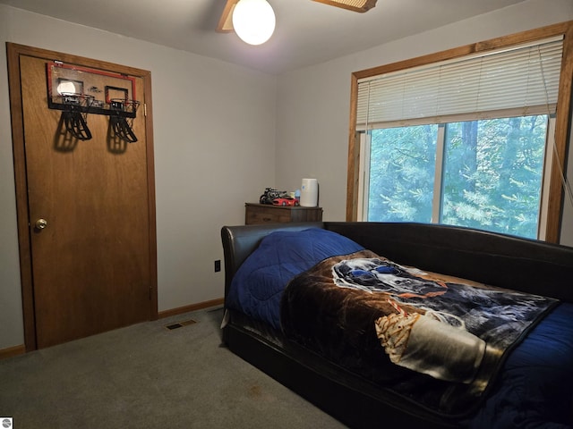 3962 Power Dr, Mikado, MI 48745 - bedroom featuring carpet and ceiling fan