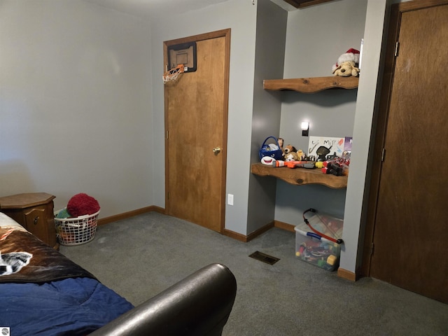 3962 Power Dr, Mikado, MI 48745 - carpeted bedroom featuring an office area and baseboards