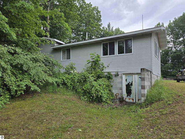 3962 Power Dr, Mikado, MI 48745 - back of property with a lawn