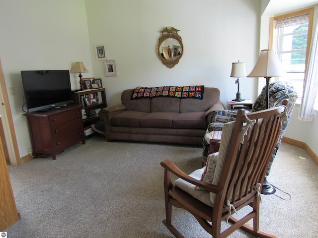 705 E Bay St, East Tawas, MI 48730 - living room featuring light colored carpet