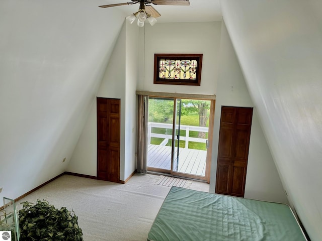 3775 W Cedar Lake Rd, Greenbush, MI 48738 - carpeted bedroom with access to exterior and ceiling fan