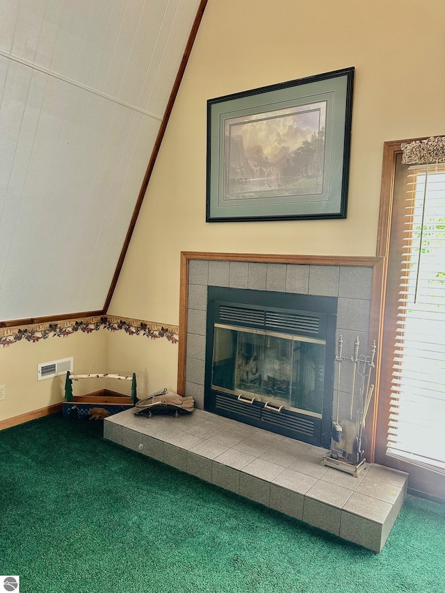 3775 W Cedar Lake Rd, Greenbush, MI 48738 - detailed view of carpet flooring and a tiled fireplace