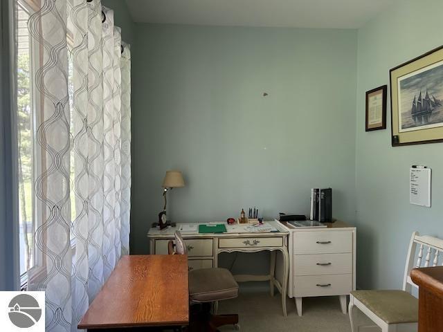 2393 Oates Rd, Tawas City, MI 48763 - home office with light carpet