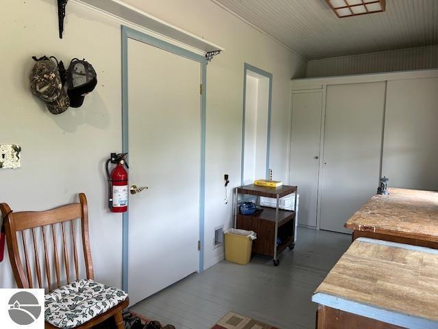2393 Oates Rd, Tawas City, MI 48763 - bedroom with a closet and wood finished floors