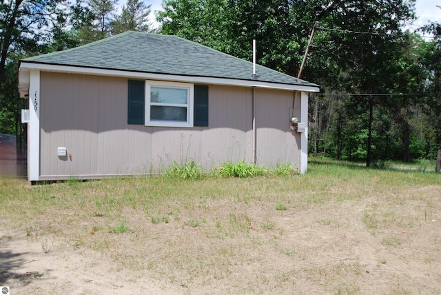 1159 Jones Rd, Saint Helen, MI 48656 - view of property exterior with roof with shingles