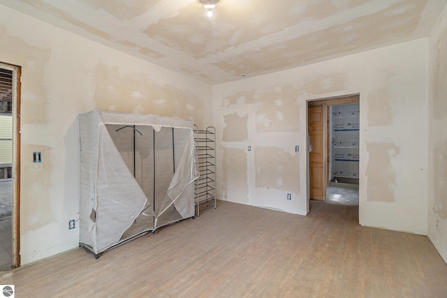 718 Forest Ave, Frankfort, MI 49635 - spare room featuring hardwood / wood-style floors