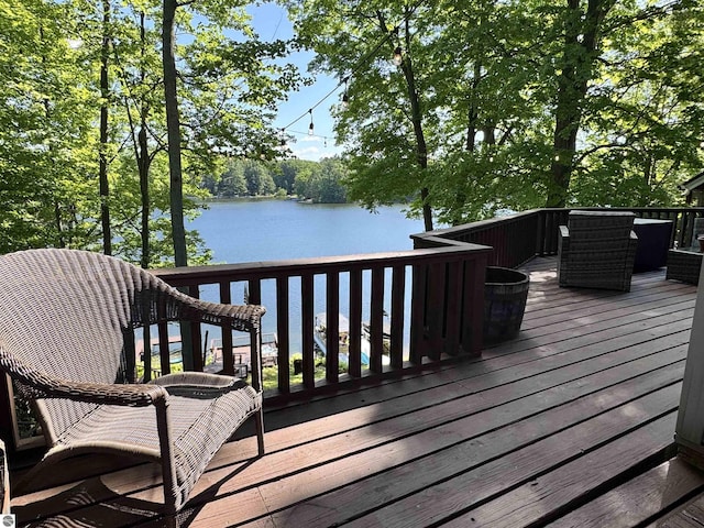 7851 White Birch Dr, Farwell, MI 48622 - wooden terrace with a water view