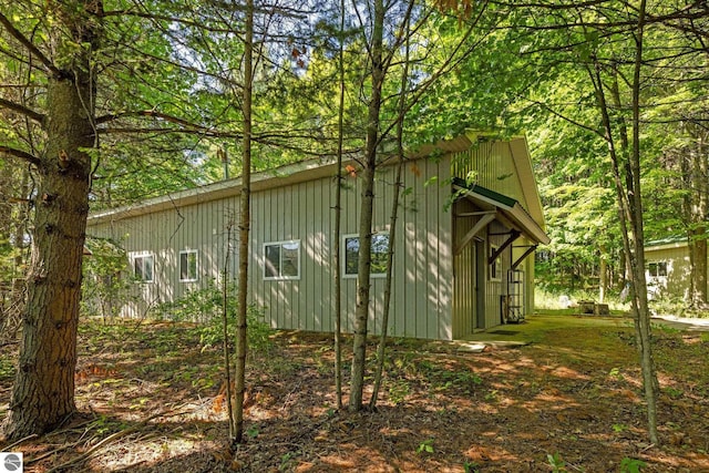12271 E Woolsey Lake Rd, Northport, MI 49670 - view of property exterior featuring board and batten siding