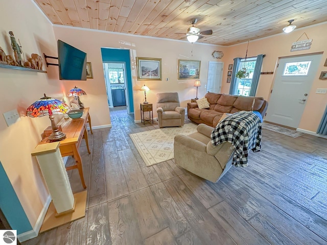 5670 N Harrison Ave, Harrison, MI 48625 - living room with hardwood / wood-style floors, a ceiling fan, crown molding, and wooden ceiling