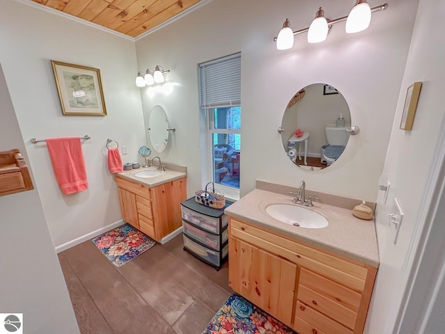 5670 N Harrison Ave, Harrison, MI 48625 - full bathroom featuring two vanities, crown molding, and wood finished floors