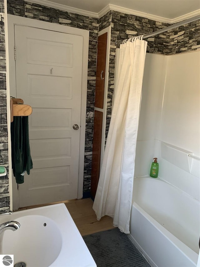 13333 S Coleman Rd, Empire, MI 49630 - full bath with ornamental molding and shower / tub combo with curtain
