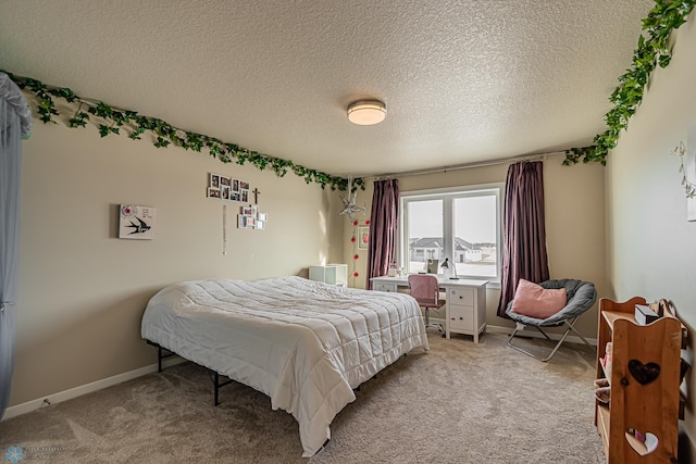 carpeted bedroom with a textured ceiling