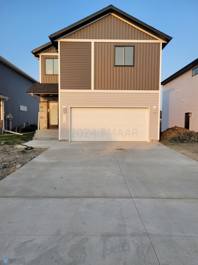 view of property featuring a garage