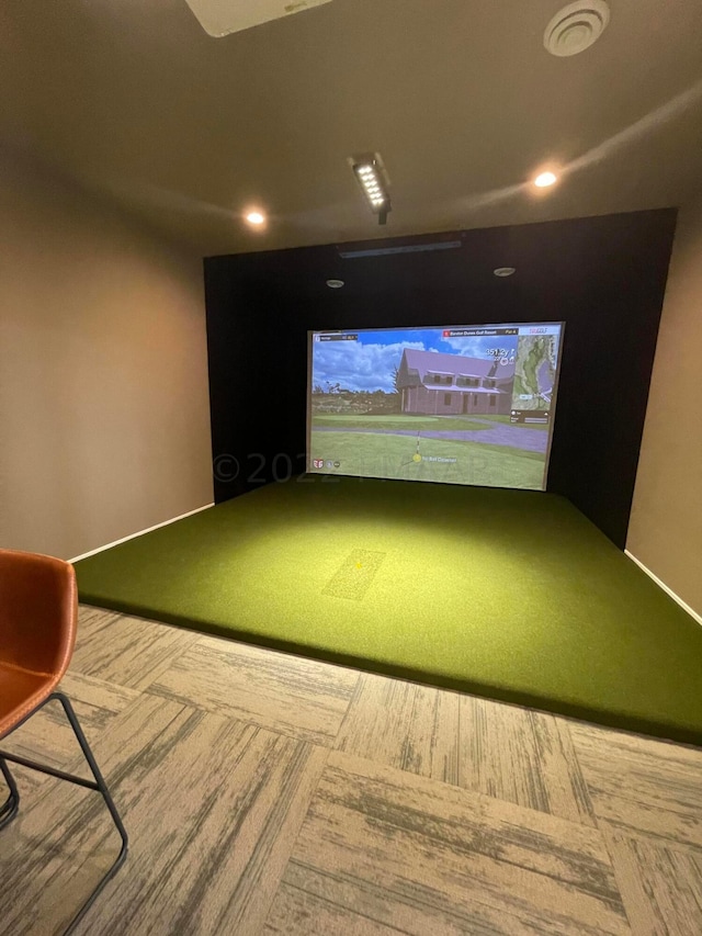 game room featuring golf simulator and carpet flooring