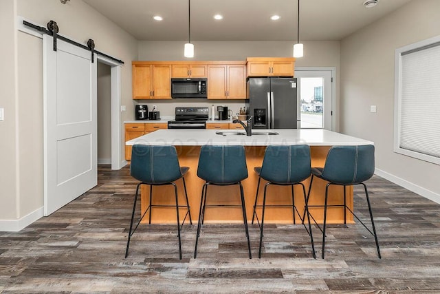 kitchen featuring decorative light fixtures, stainless steel fridge, electric range, and dark wood-type flooring