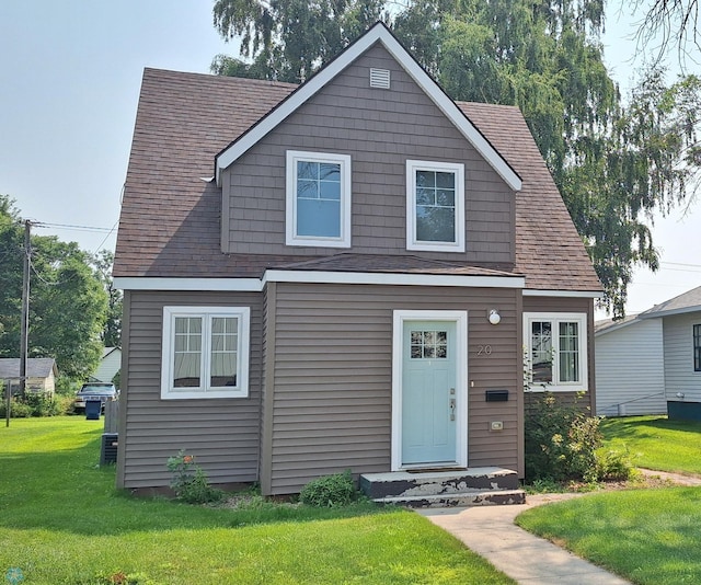 view of front facade featuring a front yard