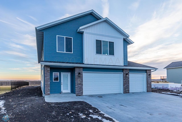 front facade with a garage