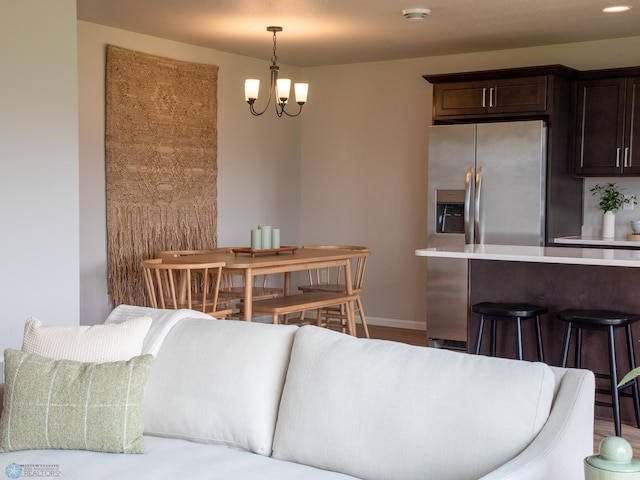 living room featuring an inviting chandelier