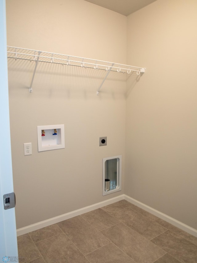 laundry room featuring hookup for a washing machine, electric dryer hookup, and tile patterned floors