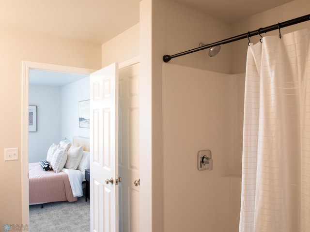 bathroom featuring curtained shower