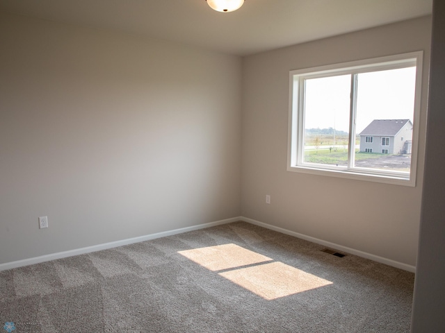 view of carpeted spare room