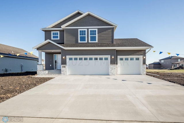 view of front of home with a garage