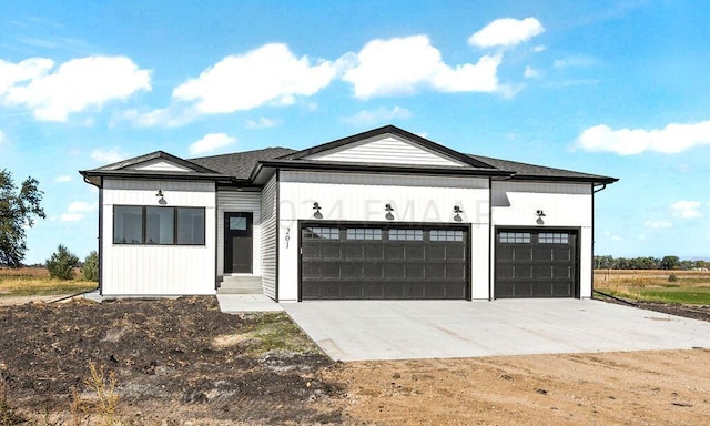 modern farmhouse style home featuring a garage