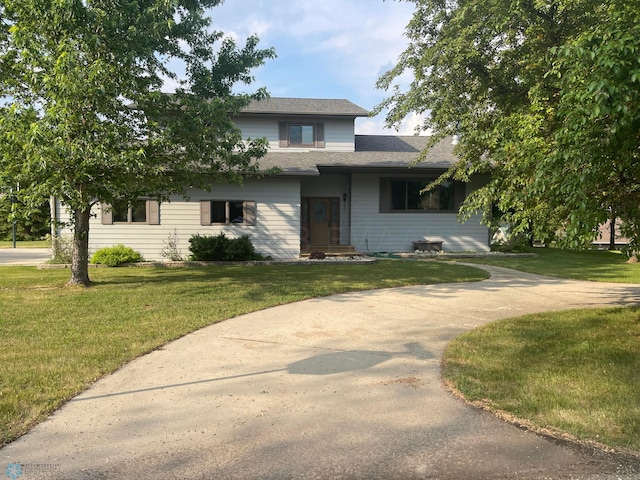 view of front of home featuring a front lawn