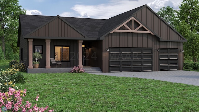 modern inspired farmhouse featuring a garage and a front lawn