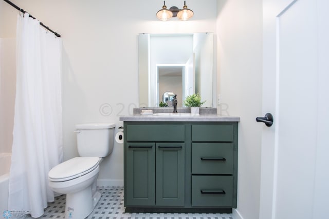 full bathroom featuring toilet, tile flooring, vanity, and shower / tub combo with curtain