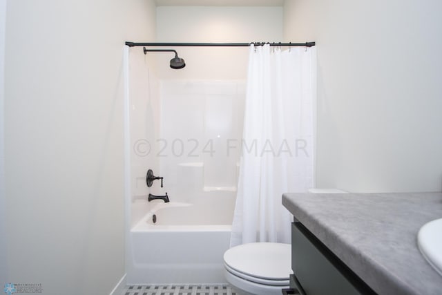 full bathroom with toilet, tile flooring, vanity, and shower / tub combo with curtain