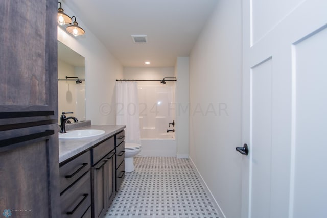 full bathroom with shower / bath combo with shower curtain, tile floors, toilet, and large vanity