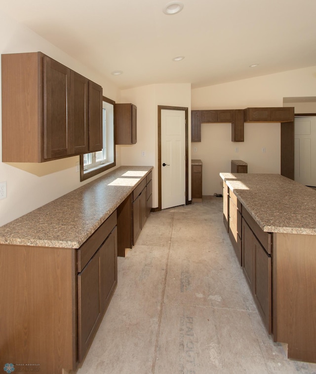 kitchen with vaulted ceiling