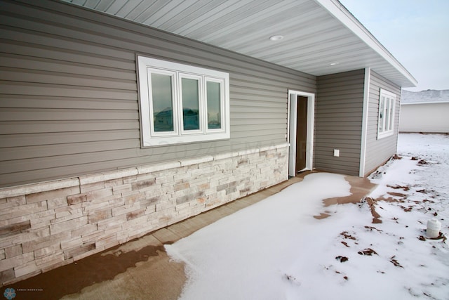 view of snow covered property