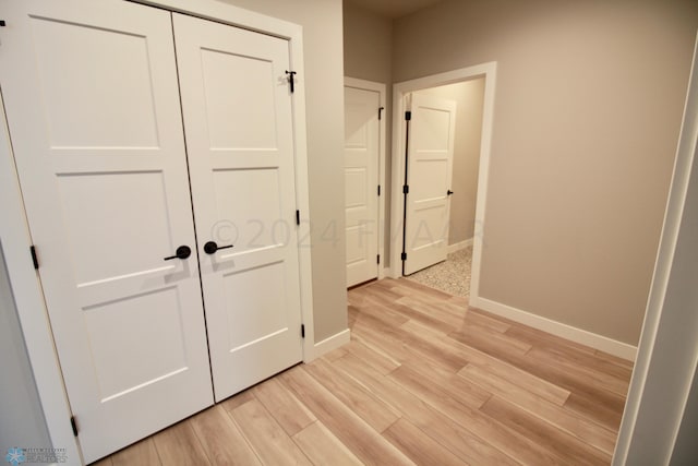 corridor featuring light wood-type flooring