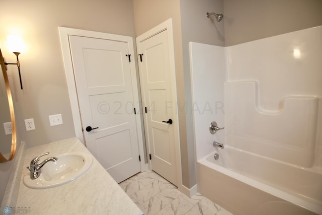 bathroom featuring shower / tub combination, vanity, and tile flooring