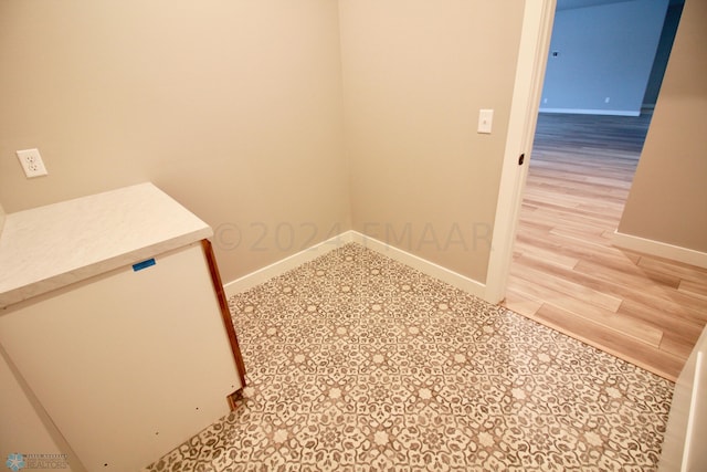 washroom with tile flooring