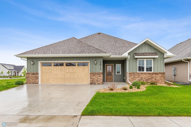 craftsman-style home with a front yard and a garage