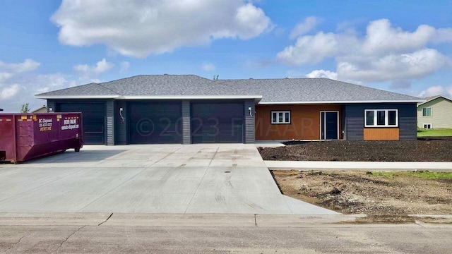 ranch-style home with a garage