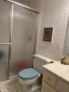 bathroom featuring an enclosed shower, toilet, tile flooring, and vanity