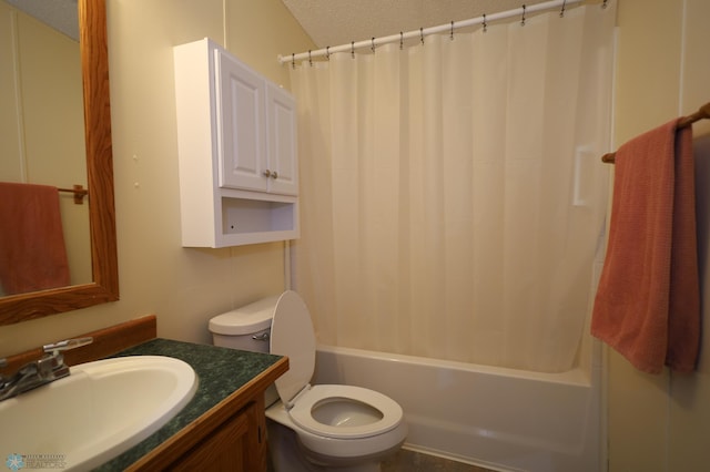 full bathroom featuring a textured ceiling, shower / tub combo with curtain, vanity, and toilet