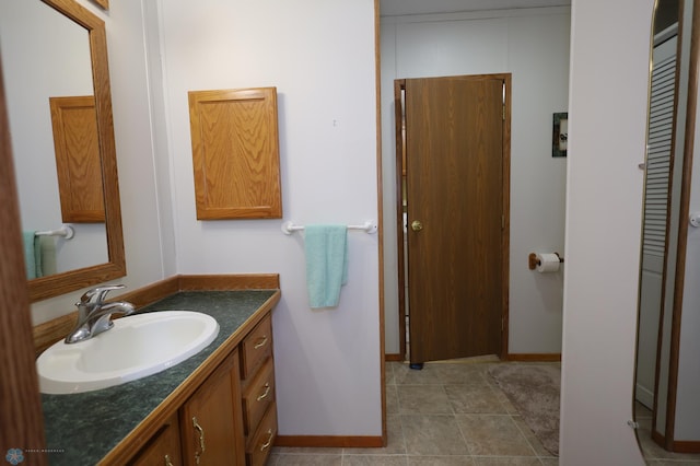 bathroom with vanity and tile patterned floors